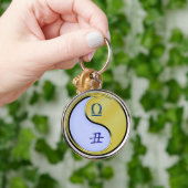 Weegschaal en metalen os sleutelhanger (Hand)