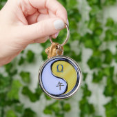 Weegschaal en metalen paard sleutelhanger (Hand)