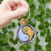 Weegschaal en vuurhond sleutelhanger (Hand)