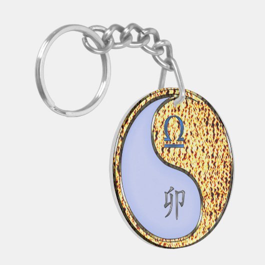 Weegschaal en vuurkonijn sleutelhanger (Voorkant Links)