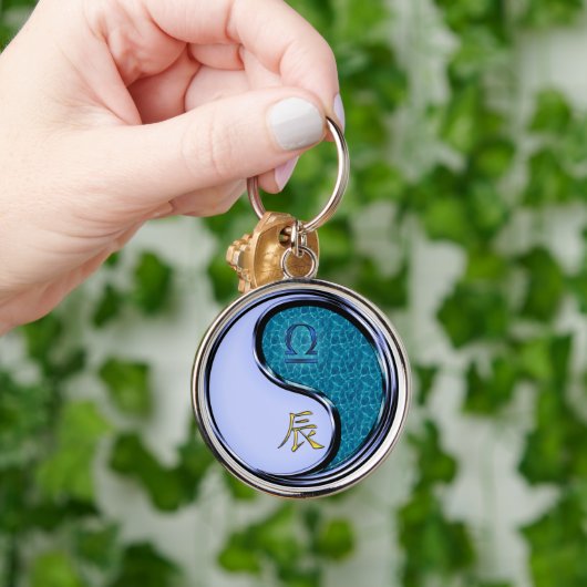 Weegschaal en waterdraak sleutelhanger (Hand)