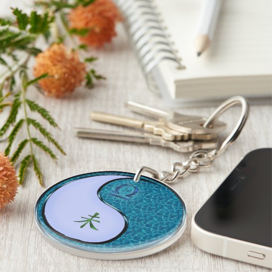 Weegschaal en watergeit sleutelhanger (Voorkant Rechts)