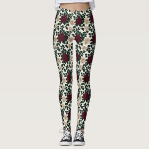 Weelderige rode en bordeauxroze rozen met donkergr leggings