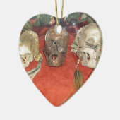 Weergave van gekrompen hoofden keramisch ornament (Links)