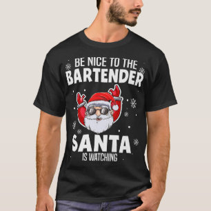Wees aardig tegen de barman die kerstman kijkt naa t-shirt
