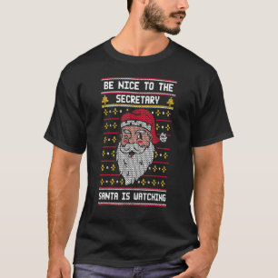 Wees aardig tegen de secretaresse Kerstman kijkt t T-shirt