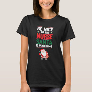 Wees aardig tegen de zuster Santa kijkt grappig. T-shirt