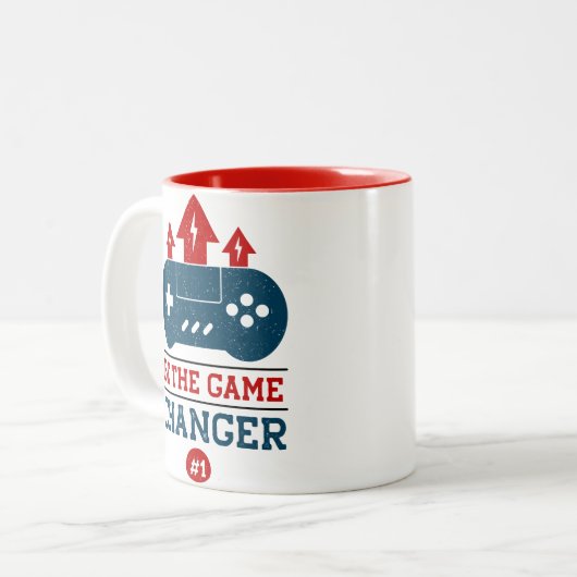 Wees de game changer #1 Gaming Tweekleurige Koffiemok (Voorkant links)