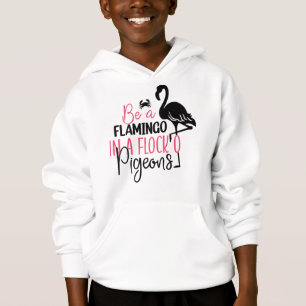 Wees een flamingo in een kudde duiven