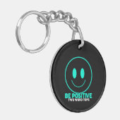 Wees positief ronde dubbelzijdige Sleutelhanger (Voorkant Links)