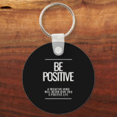 Wees positief Sleutelhanger (Achterkant)