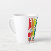 Wees zowel menselijk als vriendelijk - regenboogg latte mok (Linkerhoek)