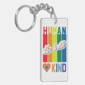 Wees zowel menselijk als vriendelijk -  regenboogg sleutelhanger (Voorkant Links)