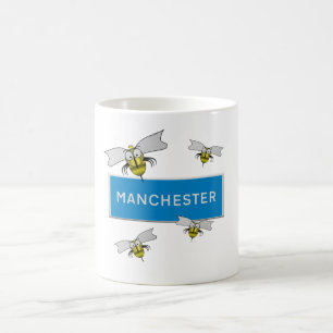 Wegwijzer naar Manchester met bijen. Koffiemok