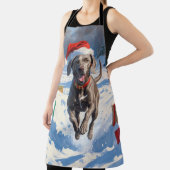 Weimaraner Rent in de Sneeuw met Kerstmuts Schort (Insitu)