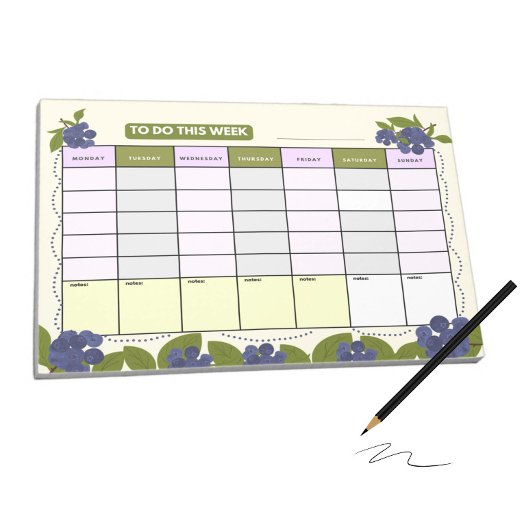 Wekelijkse planner met bosbessen notitieblok