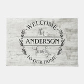 Welkom bij onze huisfamilie, kijk deurmat (Voorkant)