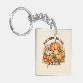 Welkom bij Onze Patch – Cosy Pumpkin Patch Sleutelhanger (Voorkant Links)