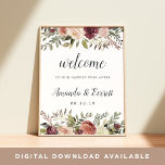 Welkom Rustic Bloom Wedding Poster<br><div class="desc">Welkom gasten op je bruiloft met ons Rustic Bloom poster,  met waterverf botanische groenery en bloemen in rijke herfstkleuren,  met "welkom in ons geluk ooit daarna",  je namen,  en trouwdatum in een chique mix van traditionele serif- en kalligrafische lettersoorten.</div>