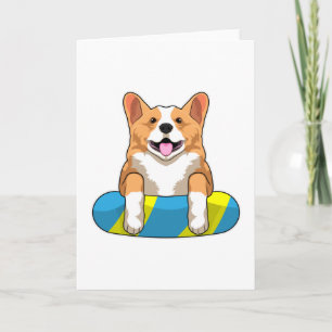 Welsh Corgi tijdens het zwemmen met een zwembord Kaart