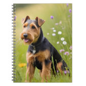 Welsh Terrier in Wildflower Meadow Notitieboek (Voorkant)