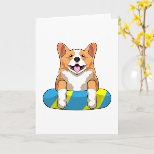 Welshe Corgi bij zwemmen met zwembord Kaart (Gele Bloem)