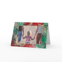 Wenskaart met kerstcadeautjes en groenen