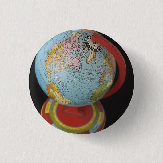Wereldbol draaien ronde button 3,2 cm (Voorkant)