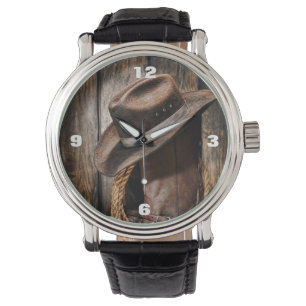 western land met bruine schuur en cowboylaarzen horloge