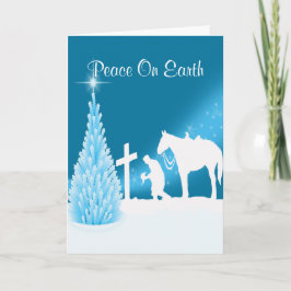 Westerne cowboy bidden bij cross feestdagen kaart