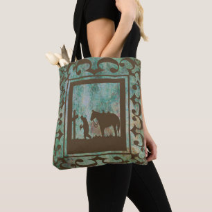 Westerne cowboy bidt bij het Cross and Horse Tas