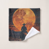 Westerne cowboy rijdt naar Oranje ondergaande maan Bad Handdoek (Wasdoekje)