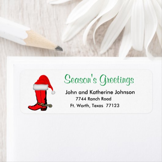 Westerne kerst cowboylaars met kerstmuts etiket (Insitu)