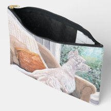 Westie kijkt uit een raam