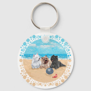 Westie met Cairn Terriers op het Strand Sleutelhanger