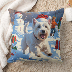 Westie rent in de sneeuw met kerstmuts kussen
