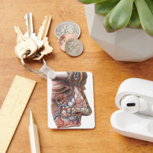 wetenschap menselijke anatomie, gezicht met neus sleutelhanger