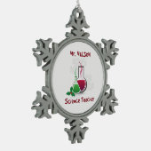 Wetenschapsleraar, experimenten met kerst tin sneeuwvlok ornament (Links)