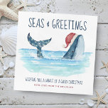 Whale Santa Zee Nautical Funny Kerstmis Feestdagenkaart<br><div class="desc">De Nautical humor kerstkaart is voorzien van een waterverf walvis die een kerstman draagt die in het zee zwemt met een snaarlicht dat zijn staart versiert. De "Zeeen & groeten" en "Een walvis met een goede kerstdag" begroeten,  samen met de naam,  kunnen gepersonaliseerd worden. Art door KL Stock</div>