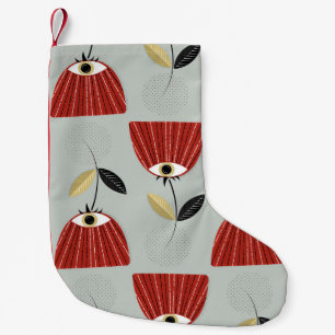 Whimsical rood bloemstuk kleine kerstsok