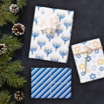 White Blue & Yellow Mixed Hanukkah Patronen Inpakpapier Vel<br><div class="desc">Het patroon van Hanukkah verpakt papieren bladen in blauw,  wit,  en geel met menorahs,  sterren van Davids,  en strepen.</div>