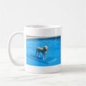 White Cockapoo Dog Swimming on a Raft Koffiemok (Links)