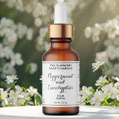 White curly text cosmetics dropper bottle label