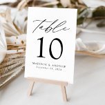 White en Black Modern Elegance Wedding Kaart<br><div class="desc">Trendy, minimalistische trouwlijstaantalkaarten met zwarte moderne letters met "Lijst" in modern kalligrafiekmanuscript. Het ontwerp heeft een witte achtergrond of een kleur van uw keuze. Het ontwerp herhaalt zich op de rug. Om tot de lijstkaarten opdracht te geven: voeg jouw naam, trouwdatum, en lijstaantal toe. Voeg elk nummer afzonderlijk toe aan...</div>