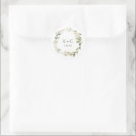 White Floral Greenery Wedding Ronde Sticker<br><div class="desc">Verhoog uw bruiloft briefpapier met onze White Floral en Greenery Wedding Envelope of Favor Sticker. Deze prachtige sticker toont een delicaat arrangement van witte bloemstukken en weelderig groen, en voegt een vleugje elegantie en natuurlijke schoonheid toe aan uw uitnodigingen, enveloppen of favoriete verpakkingen. Ontworpen met nauwgezette aandacht voor detail, vult...</div>