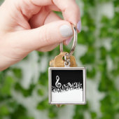White Jumked Musical Notes op zwart Sleutelhanger (Hand)