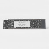 White music notes on black background  bureau naambordje (Voorkant)