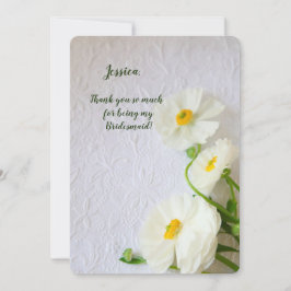 White ranunculus op getextureerd papier bedankt kaart