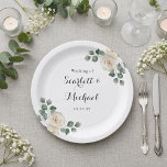 White roses Spring Floral Romantic Wedding Papieren Bordje<br><div class="desc">Bring refined botanical elegance to your reception tables with this beautifully designed wedding plate inspired by a watercolor white roses garden wedding. Soft white rose florals and delicate greenery are thoughtfully arranged along the edges, creating a balanced botanical detail that frames the center of the plate. The gentle floral artwork...</div>