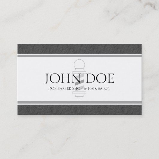 Whitepaper over donkergrijze rand van barber/haar visitekaartje (Voorkant)